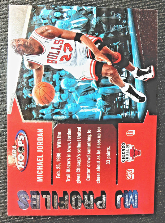 A vintage 1998 NBA Hoops Michael Jordan trading card featuring a red left panel with player text and a photo of Jordan in a Chicago Bulls jersey on the right.